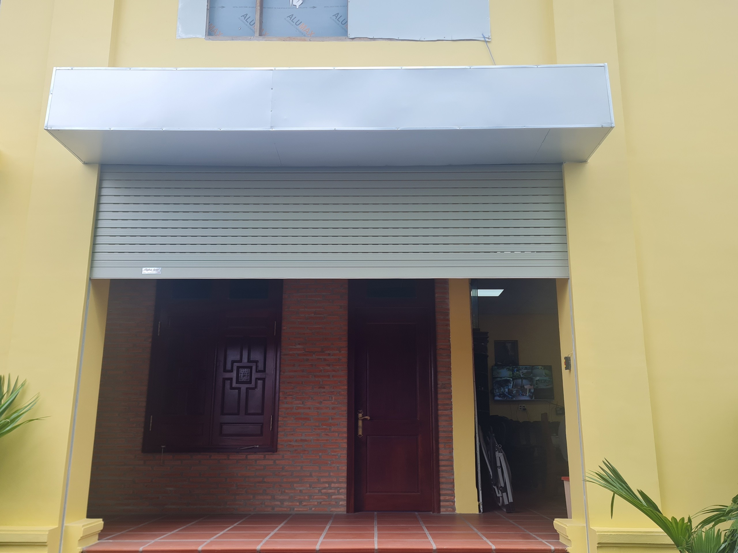 cửa cuốn lỗ thoáng cao cấp cửa cuốn đức alpha door